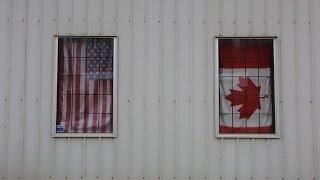 For These Border Towns, The Only Wall Here is a Row of Potted Plants