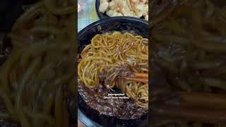 Korean food delivery is amazing - ordering black bean noodles! 