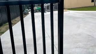 Single swing assure hd gate with sloped bottom. Automated.