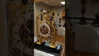 A large architectural English brass quarter chiming skeleton clock with quarter chiming, circa 1860