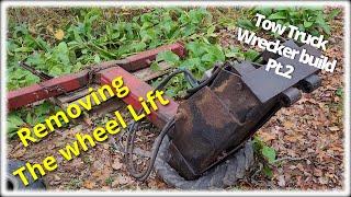 How to repair a tow truck wheel lift