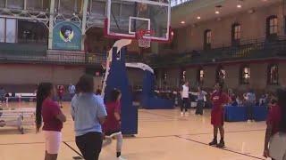 NYC kids shoot free throws for basketball fundraiser