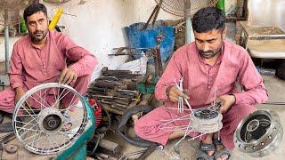 A Hardworking Man Assembling Motorcycle Wheel with Hub and Stainless Steel iron Rod || How to Makes