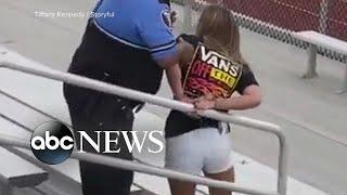 Woman tased, arrested for refusing to wear a mask at football game | WNT