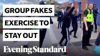 Coronavirus UK: viral video shows group pretending to exercise when approached by police