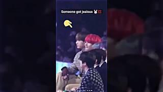 Jungkook got jealous of Taehyung's fanboy ‼️ his reaction is so obvious #shorts #taekook #ytshorts