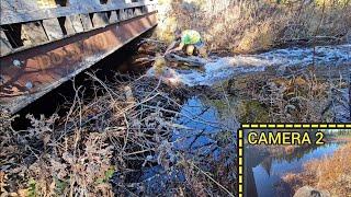 Complete Unclogging Of A Bridge Creating Massive Flow And Draining Pond