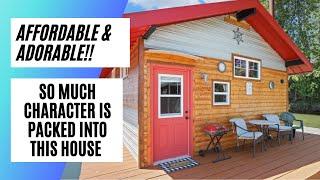 Small floating house with a small price tag & tons of character!