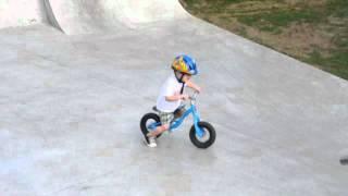 Damon 2 yrs - at the skate park on his Norco Run bike