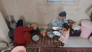 Nomadic daily life, working the stove, cooking local buttermilk by the family