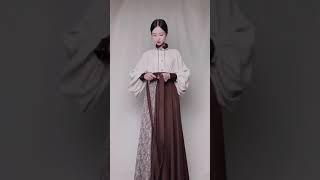 Chinese traditional clothes, hanfu. Chocolate color scheme.