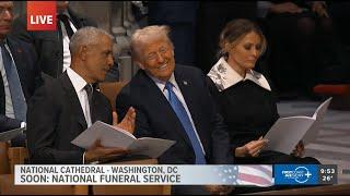 Donald Trump, Barack Obama share words and smiles at Jimmy Carter funeral