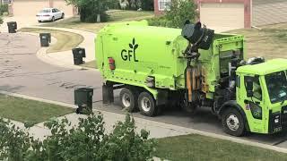 LArge Collection of Garbage Men Hand Loading Heavy Items