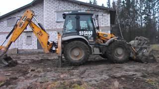 Выравнивание глины на участке колесным трактором JCB 4CX - Спецтехника39