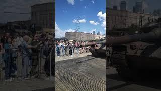 Vertical video. Moscow, Russia. Leopard 2A6 tank (Germany). Exhibition of captured equipment on P...