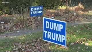 Green family with 'Dump-Trump' sign finds electric meter ripped off their home