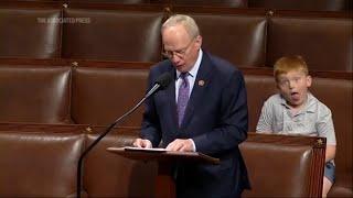 Congressman's son steals show on House floor, hamming it up for cameras