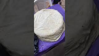 Nietas de Doña Coyo haciendo tortillas de harina sobaqueras