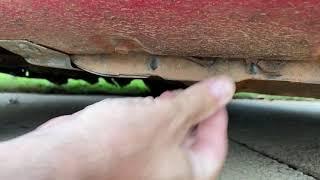 Water in Miata rocker panels.