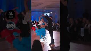 Sweeping across the floor, leaving trails of stardust. | The Snow Ball DanceSport Competition