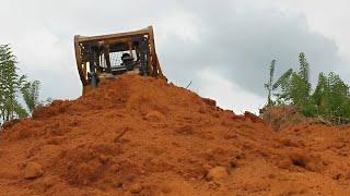 Operator Amazing CAT D6R XL Bulldozer Builds Roads on the Mountain