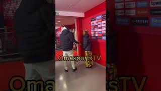 Boniface introduces his grandmother to Bayer Leverkusen teammates.