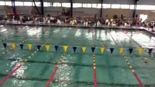 Tyler swims the 8 & under 50 butterfly = 1st place