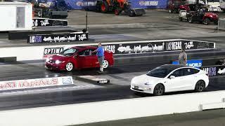 White Tesla Model 3 EV Vs. Red Honda Civic Sedan Drag Race - Las Vegas 6-2-2023 - 4K UHD