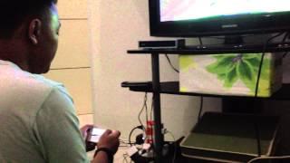 Playing Real Racing 3 using iPhone 5 to TV Screen