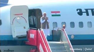 PM Modi Arrives In Ahmedabad For Namaste Trump Event