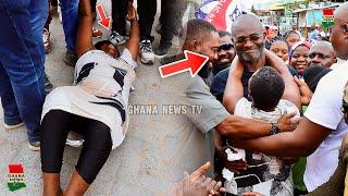 Hilarious: Woman lay on the floor for Kennedy Agyapong to walk on her as he campaigns at Amasaman