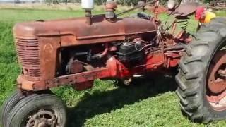 Camera Shy Farmer Cutting hay like 1950