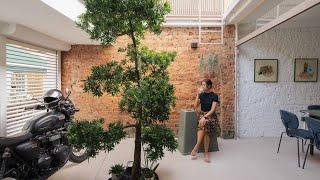 Inside A Biker Couple's 1940s Heritage Shophouse With A Motorcycle Garage