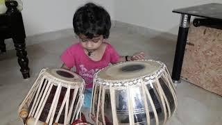 1 n half year old kid Dishitha Mounesh playing Tabala..(1)