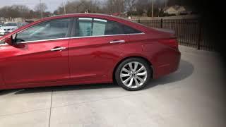 Jackie Cooper INFINITI Andrea 2011 Hyundai Sonata red