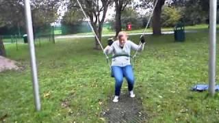 girl falls off swing lol