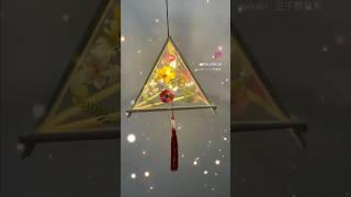 How to make DIY flowers pressed triangle lantern #DIY Lighting #woodstickcrafts #diy #HomeDecor