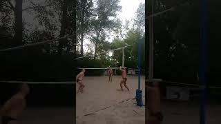 Beach volleyball, unexpected block.