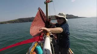 Dinghy cruising a Welsford Navigator where Arwen makes a new friend out on the water