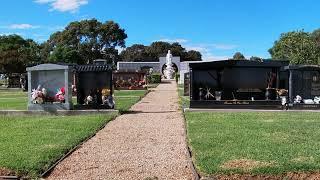 Buddhist #cemetery #graves with Buddha statue in memorial park - Enfield Memorial Park