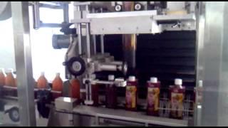 Automatic plastic shrink Label sleeve applicator
