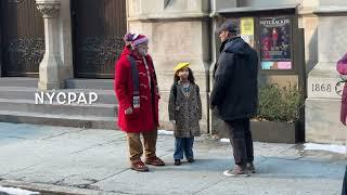 Arnold Schwarzenegger plays Santa Claus as he films  The Man With The Bag in New York City