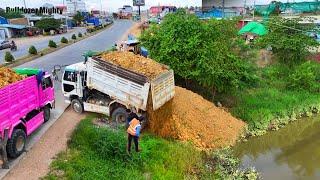 Filling Up The Land huge, Bulldozer KOMATSU D20P Push Soil & Stone Into Water, Dump Truck