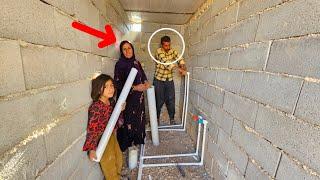 Single mother and her daughters' efforts in bathroom plumbing with the help of expert master