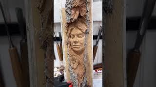 Carving a Woman in Wood