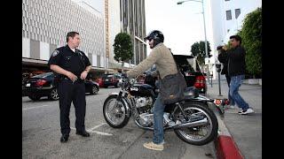 2011 Keanu Reeves speaking with a Beverly Hills Police officer