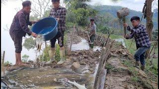 Father and son dig a pond to release fish. life outside freedom