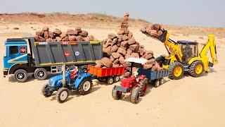 Jcb 5cx backhoe loading stone in Tata truck 2518 and Tata tipper truck | Mahindra tractor trolley