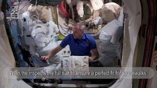 David Saint-Jacques and his spacesuit