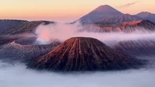 Smoking crater of Mount Bromo,  EXPLORING OTHERWORLDLY LANDSCAPE  Java island - Indonesia